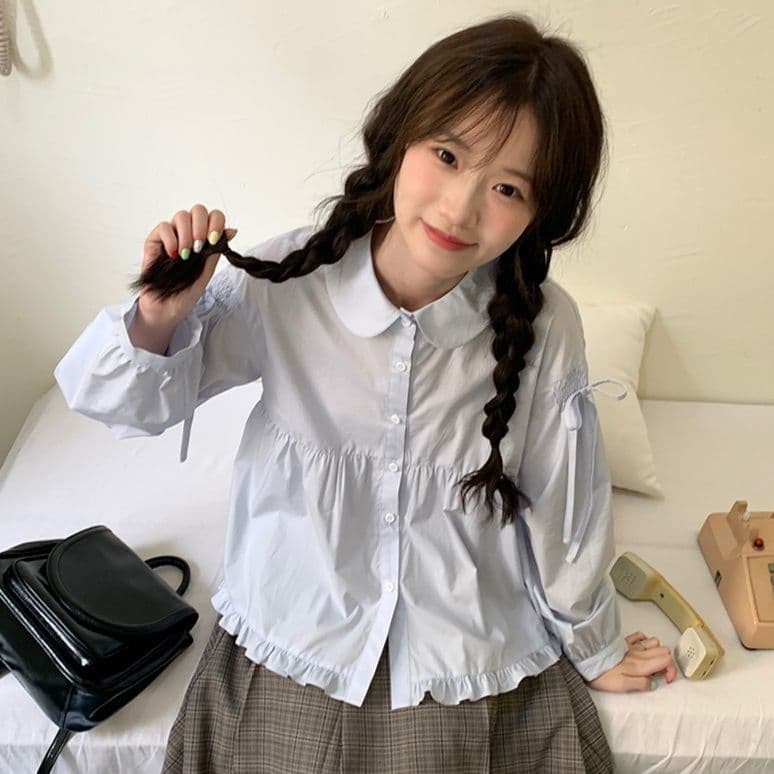 フリルブラウス 優美な丸襟裾フリルブラウス